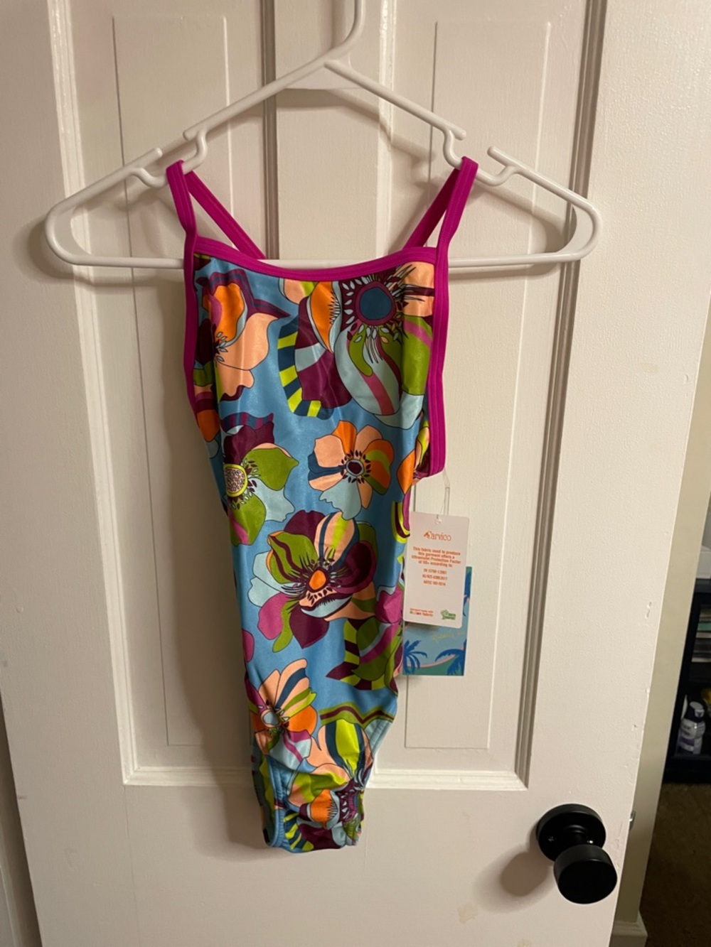 Competitive swim suit. Bright Floral Girls' One-Piece Swimsuit with Pink Trim